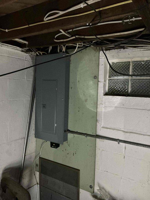 Completed electrical estimate for whole-house generator installation at residential property with existing natural gas service and no HOA restrictions. Assessed existing electrical panel configuration, available capacity, and optimal transfer switch placement in basement utility area. Documented current electrical infrastructure including main service panel, distribution system, and proposed installation location for automatic transfer switch and generator connection.