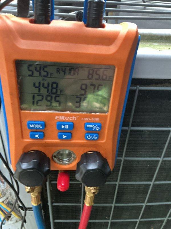 Completed comprehensive MVP air conditioning maintenance service on residential HVAC system. Performed thorough inspection of air handler unit, including examination of air filtration system with pleated filters showing normal dust accumulation. Conducted detailed diagnostic testing of cooling system using digital manifold gauges, measuring system temperatures and pressures at outdoor condensing unit. All temperature and pressure readings were recorded and analyzed to verify proper refrigerant charge and system performance. System operating within manufacturer specifications upon completion of maintenance procedures.