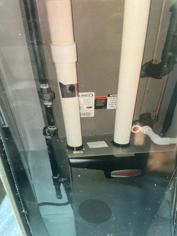 Completed comprehensive MVP AC maintenance on Lennox cooling system. Performed thorough inspection of condensate drain pan and drain line assembly, verified proper drainage function and cleared debris from pan base and perforated drain grate. Inspected all PVC drain piping, refrigerant lines, and system connections for proper operation and secure mounting.