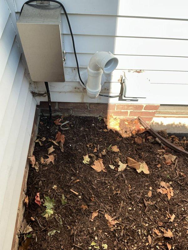 Replaced existing Rinnai tankless water heater with new Navien NPE-240 model. Installation included new service valves on hot and cold water lines, copper piping connections with brass fittings, and replacement of exhaust venting system with new PVC pipe and elbows routed through exterior wall. Unit mounted on wooden backing board in utility area, programmed to 125°F, and tested for proper operation.