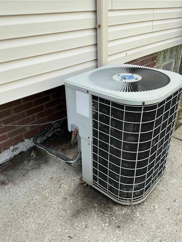 Completed HVAC system evaluation for non-cooling air conditioning unit. Assessed aged outdoor condenser unit showing significant wear and weathering, along with indoor furnace equipment in basement mechanical room. Provided comprehensive replacement estimate for complete system upgrade due to equipment age and condition.