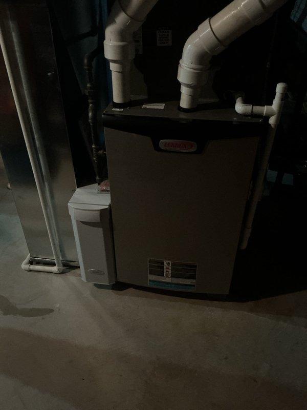 Completed comprehensive MVP furnace maintenance on residential heating system. Performed standard inspection procedures, verified proper operation of all components, and checked condensate drainage lines and PVC routing for proper function. Unit found to be operating within normal parameters with no immediate service needs identified.
