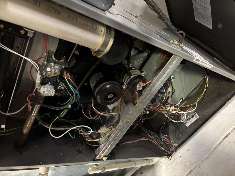 Completed routine MVP cooling maintenance visit on 7-year-old residential HVAC system. Inspected outdoor condensing unit and indoor air handler components, verified proper operation of condenser fan assembly, checked refrigerant line connections and electrical wiring at outdoor unit, and examined blower motor assembly and gas valve connections within indoor unit compartment. All system components found operating within normal parameters with no immediate service needs identified.