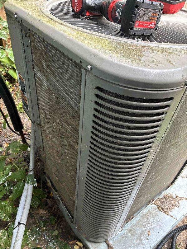 Completed scheduled MVP cooling maintenance visit on residential outdoor condenser unit. Upon arrival, observed unit operational but exhibiting significant environmental accumulation including dirt, debris, algae, and mildew growth on exterior surfaces, panels, and coil fins. Performed comprehensive maintenance protocol including inspection of all accessible components, cleaning of condenser coils and exterior surfaces, and verification of proper system operation. Unit confirmed functioning within normal parameters following service completion.