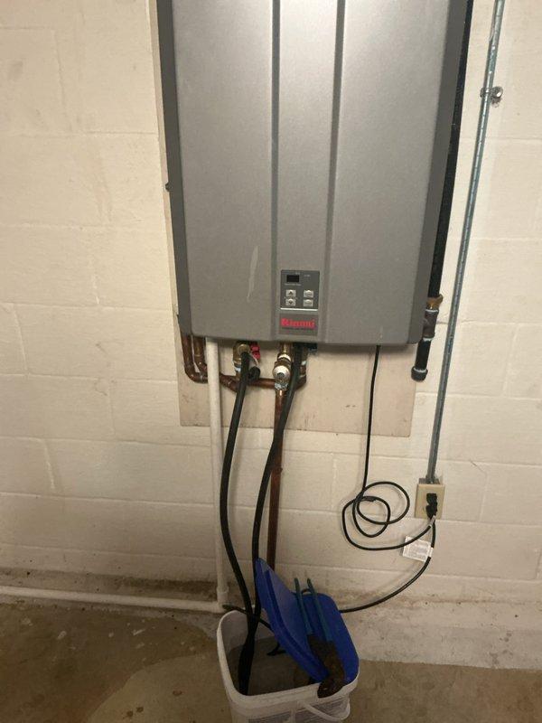 Performed annual descaling maintenance on a 4-year-old Rinnai tankless water heater unit. Flushed the heat exchanger with descaling solution to remove mineral buildup and ensure optimal performance and efficiency. Unit tested successfully upon completion with all systems operating within normal parameters.