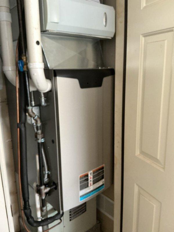 Completed scheduled heating maintenance on 2-year-old gas furnace system. Performed comprehensive inspection of furnace unit, verified proper operation of all components, checked combustion system, inspected heat exchanger, tested safety controls, and confirmed adequate airflow. Utilized diagnostic equipment to measure system performance parameters and documented equipment condition with photos showing furnace installation and associated plumbing connections in utility closet.