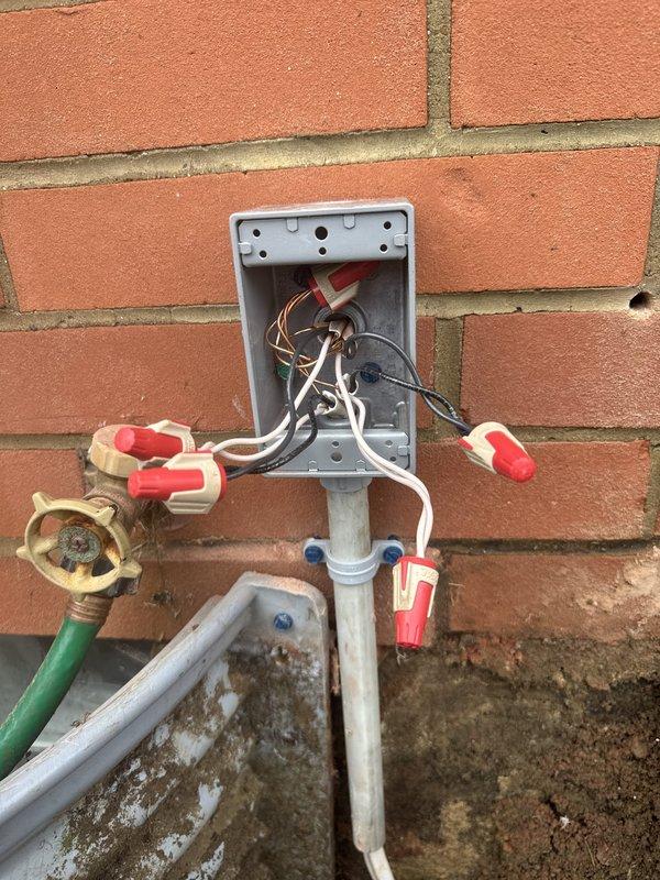 Installed electrical wiring and connections for septic system operation. Ran new electrical circuit from main panel through attic space to exterior junction box mounted on brick wall, utilizing appropriate gauge wire and weatherproof enclosures. Completed all wire terminations with proper wire nuts and secured exterior junction box to ensure code-compliant installation for septic system power supply.