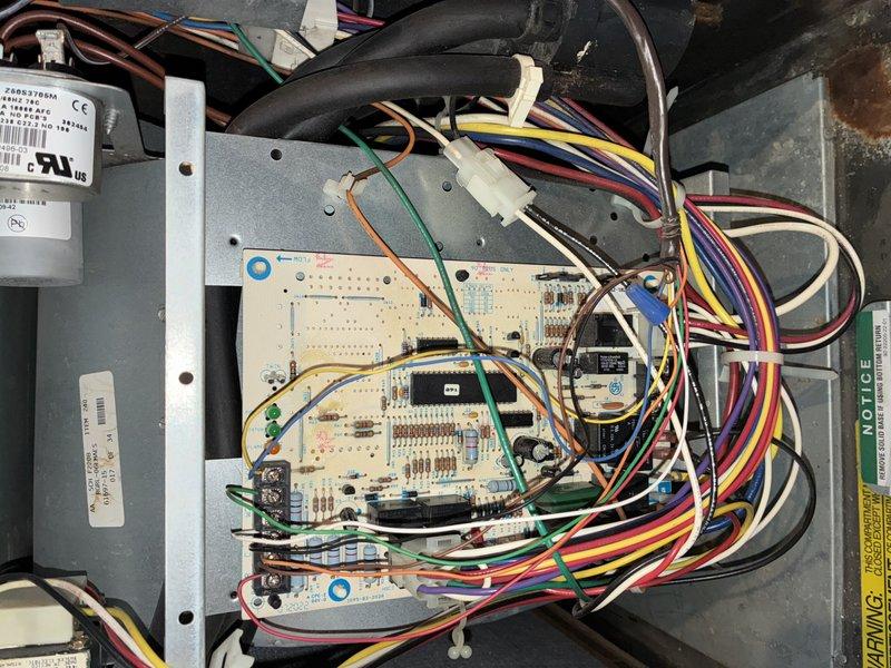 Completed comprehensive MVP AC maintenance on residential cooling system. Performed thorough inspection of evaporator coil assembly, verifying proper refrigerant line connections and insulation integrity on all white foam-wrapped copper lines. Examined control board and electrical connections within air handler cabinet, confirming all wire terminations, capacitor function, and circuit board operation. All components found operating within normal parameters with no deficiencies noted.
