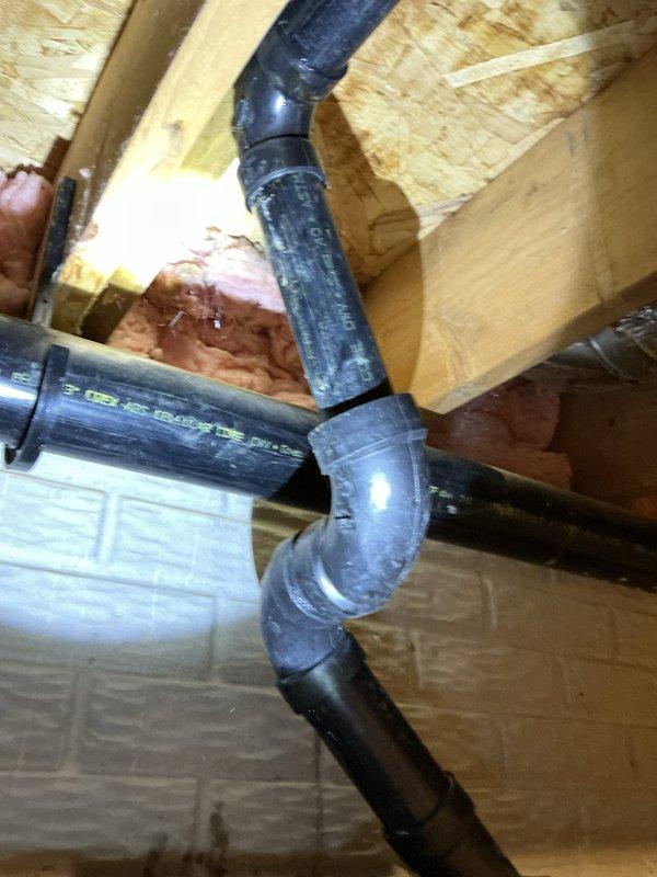 Responded to a plumbing emergency involving a cracked ABS drainpipe connecting the condensate pump pit to the main sewer line leading to the septic tank. Located and assessed multiple cracks in the 2.5-inch O.D. pipe in the basement near the sewer pipe exit point, which was actively leaking during pump operation. Replaced the damaged ABS pipe section with new piping, installed proper fittings and clamps at connection points, and tested the system to ensure watertight integrity during pump cycles.