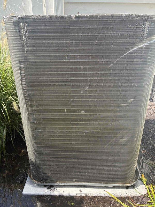 Completed scheduled MVP cooling maintenance visit on residential air conditioning system. Inspected outdoor condenser unit and interior ductwork components, including louvered grilles and sheet metal connections. All components found in operational condition with minor surface debris accumulation noted on condenser fins and duct grilles.