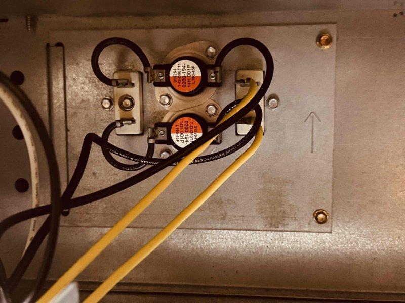 Completed MVP heating maintenance on system located in bedroom closet. Performed comprehensive inspection of blower wheel assembly, electrical connections, and terminal block, documenting condition of all components with photographs. Verified proper wire connections on control panel, inspected blower motor assembly and squirrel cage fan wheel, and confirmed all electrical terminals were secure and functioning within normal parameters.