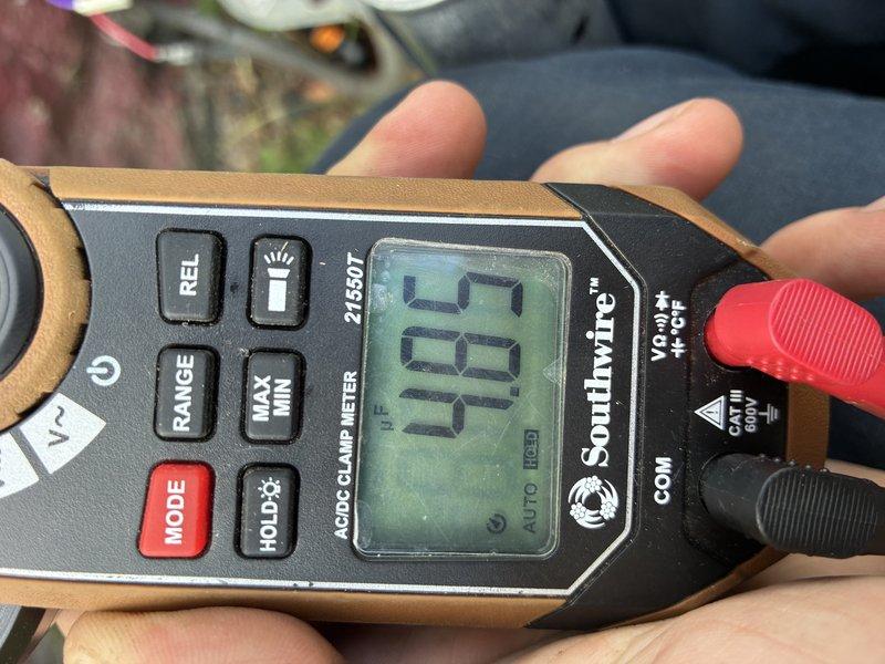 # HVAC Service Report

Responded to no cooling complaint on 6-year-old central air conditioning system. Upon arrival, performed diagnostic testing using digital clamp meter to measure electrical parameters and current draw at the outdoor condensing unit. Readings indicated system was not operating within normal specifications. Identified and resolved issue preventing proper cooling operation. System tested and verified operational with proper amperage readings following repair. Unit restored to normal cooling function.