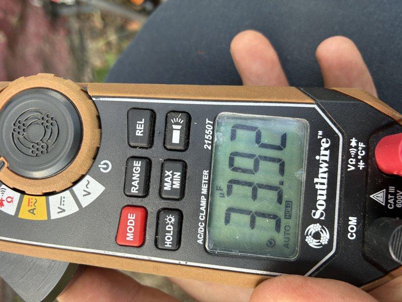 # HVAC Service Report

Responded to no cooling complaint on 6-year-old central air conditioning system. Upon arrival, performed diagnostic testing using digital clamp meter to measure electrical parameters and current draw at the outdoor condensing unit. Readings indicated system was not operating within normal specifications. Identified and resolved issue preventing proper cooling operation. System tested and verified operational with proper amperage readings following repair. Unit restored to normal cooling function.