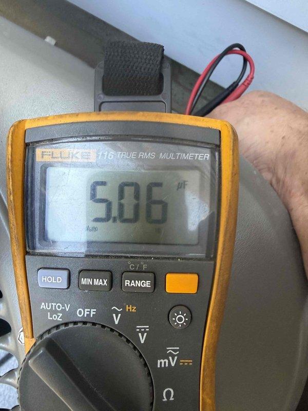 Responded to service call for main house fuse repeatedly blowing while operating a one-year-old air conditioning system. Performed electrical diagnostics using multimeter at the outdoor condenser unit, measuring voltage and amperage to identify potential overcurrent condition. Inspected capacitor as suggested by customer's electrician, along with compressor and fan motor electrical components, to determine root cause of circuit overload and eliminate newly installed equipment as source of repeated power failures.