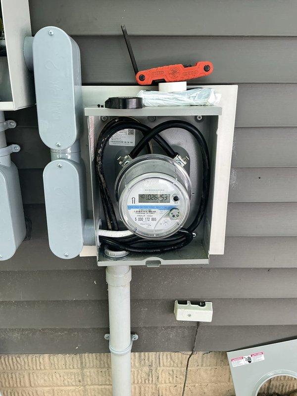 Replaced defective main PVC conduit fitting at electrical service entrance under warranty. The repair involved the conduit system connecting the utility meter, main disconnect panel, and Generac transfer switch. All required materials were available from truck stock, and the installation was completed to restore proper protection for the service entrance wiring.