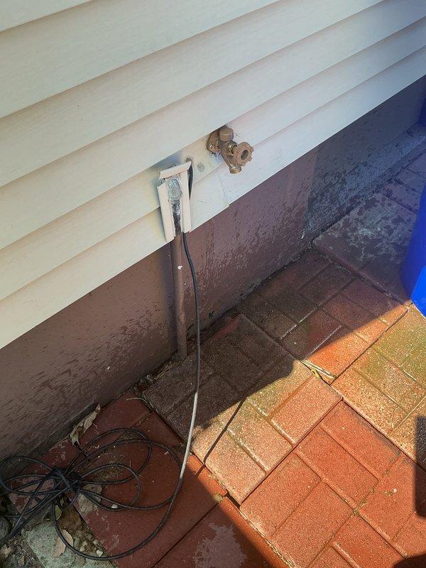 Replaced deck-mounted laundry faucet with new fixture in interior laundry area. Upgraded exterior hose bibs to frost-free silcocks at multiple locations around the property perimeter, providing freeze protection for outdoor water access. Installed ball valve at rear of house to provide shut-off control for exterior water supply line.