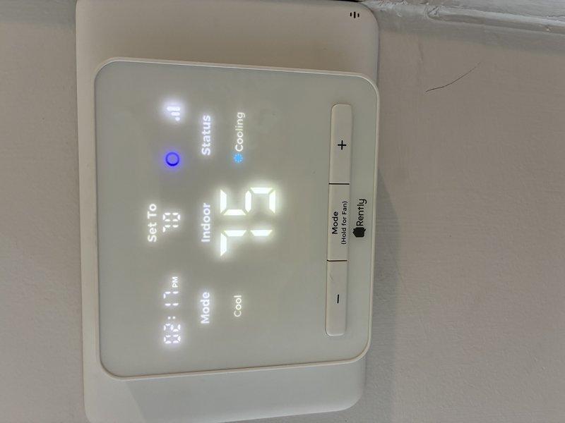 Responded to service call for thermostat communication failure with newly installed HVAC system resulting in no cooling. Diagnosed and resolved connectivity issue between thermostat and air conditioning unit, verified proper system operation, and confirmed thermostat display showing correct cooling mode and temperature settings at 72°F with setpoint of 73°F.