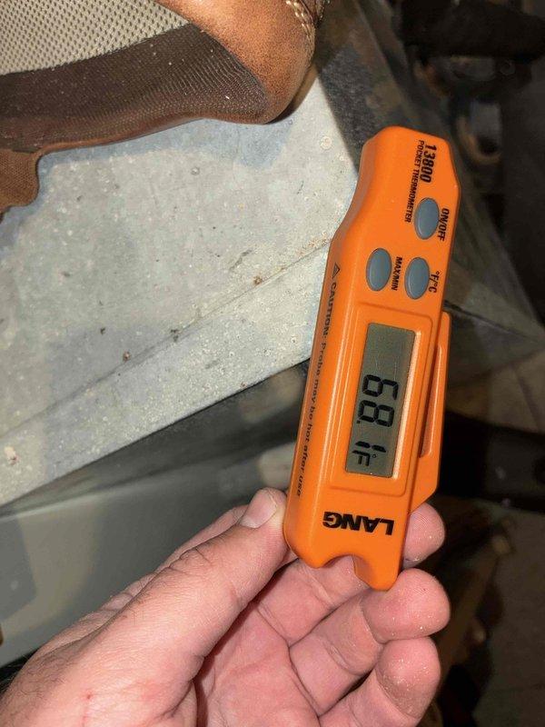 Completed MVP cooling maintenance visit on 4-year-old system. Upon inspection, discovered extensive frost and ice buildup covering the entire evaporator coil, indicating a refrigerant flow restriction or low charge condition. Documented coil condition with photos showing complete frost encasement of coil fins and copper refrigerant lines. Measured supply air temperature at 88°F, confirming insufficient cooling capacity and system malfunction. Further diagnostics required to determine root cause of freezing condition, which may include refrigerant leak, restricted metering device, low airflow, or failed components.