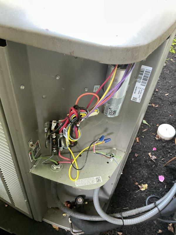Completed MVP cooling maintenance visit on outdoor HVAC unit. Performed inspection of electrical compartment, verified all wire connections and terminals were secure, and documented system condition with photos. Unit exterior panels and components showed normal weathering; all electrical connections, conduit lines, and refrigerant lines were intact and properly configured with no immediate service concerns identified.