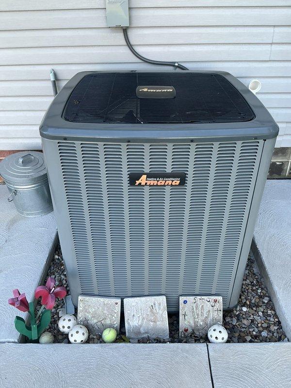 Completed recurring MVP maintenance visit on 2-year-old Amana furnace and air conditioning system. Performed comprehensive inspection of indoor furnace unit and outdoor condenser, verified all operational parameters, checked electrical connections and safety controls, inspected condensate drainage system and PVC venting, and confirmed proper system operation for both heating and cooling components.