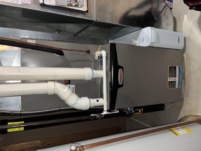 Completed comprehensive AC tune-up and maintenance on 2017 cooling system as part of preventative maintenance program. Performed full system inspection of indoor air handler and outdoor condensing unit, measured electrical amperage draw with clamp meter to verify proper compressor operation, inspected refrigerant lines and insulation for integrity, checked condensate drainage system and PVC piping for proper flow, verified all safety labels and manufacturer specifications, and confirmed system operational parameters within normal ranges. No deficiencies noted; unit operating efficiently with no reported issues.