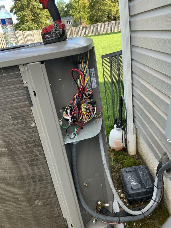 Performed comprehensive AC tune-up on residential split system with Lennox air handler located in basement and outdoor condensing unit. Completed full system inspection including electrical connections, refrigerant levels, and component functionality during scheduled preventive maintenance visit.