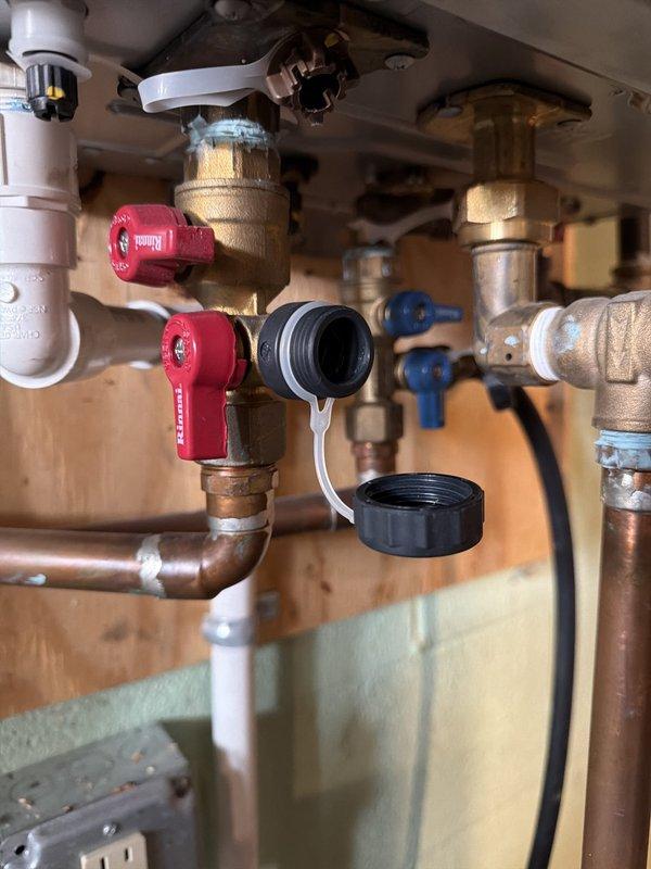 Completed warranty service on tankless water heater installation, performing comprehensive system flush and inspection of all plumbing connections. Verified proper operation of isolation valves, service ports, and flow meter, confirming all components meet manufacturer specifications and warranty requirements.