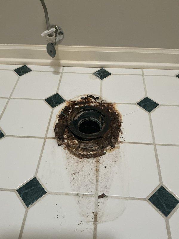 Installed customer-supplied toilet in bathroom with octagonal tile flooring, including replacement of shut-off valve with company-supplied valve. Completed installation per standard plumbing code requirements, ensuring proper sealing and water connection functionality.