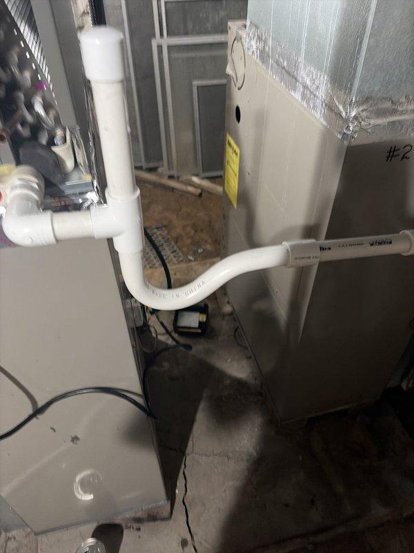 Completed full HVAC system installation including new air handler unit with supply ductwork and outdoor condensing unit. Installed 20-amp dual fuse disconnect at exterior unit, ran condensate drain line from air handler using PVC piping, and completed all electrical connections between indoor and outdoor equipment. System tested and verified operational upon completion.