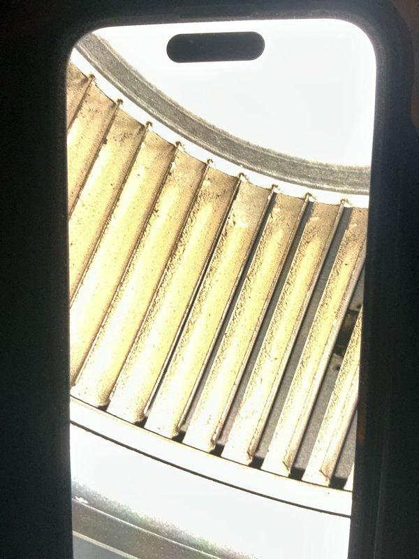 Completed comprehensive maintenance service on 9-year-old gas furnace as part of MVP recurring maintenance program. Performed standard heating system inspection, verified proper operation of all components, and examined heat exchanger fins which showed normal aging with minor surface discoloration but remained structurally sound. Inspected air filtration system, noting filter media had accumulated dust and particulate matter consistent with normal usage; filter pleats and frame showed appropriate service wear. All system components functioning within manufacturer specifications.