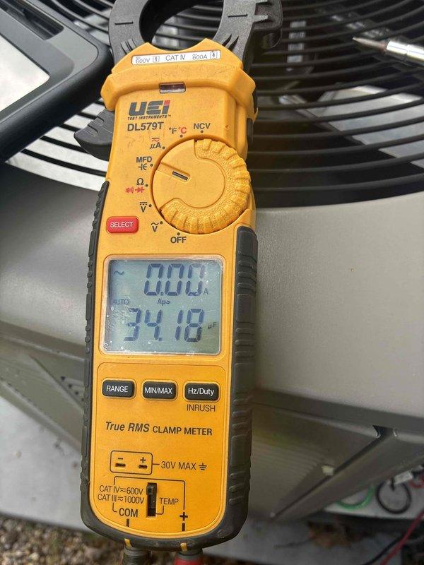 Completed MVP cooling maintenance visit on two HVAC units. Performed comprehensive system diagnostics including electrical measurements using clamp meter, verified proper amperage readings, and inspected evaporator coils. Both units' coils showed acceptable condition with minor dust accumulation between fins, confirming systems are operating within normal parameters for continued reliable cooling performance.