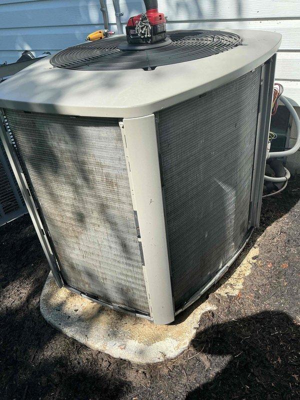 Completed full system tune-up on 7-year-old air conditioning system. Performed comprehensive inspection of outdoor condensing unit, replaced furnace filter, and verified all components operating within manufacturer specifications. Unit shows normal wear consistent with age, with exterior panels displaying surface deterioration but no impact on system performance or efficiency.