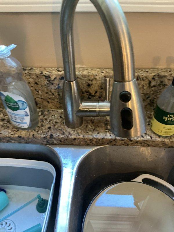 Responded to service call for estimate on installation of two local shut-off valves and repair of leaking pipe. Upon arrival, assessed existing plumbing configuration beneath kitchen sink, which consisted of copper supply lines with brass fittings mounted to wall. Inspected flexible braided stainless steel supply hoses connecting to fixture above. Identified areas requiring shut-off valve installation to provide localized water control for future maintenance and emergency situations. Examined leaking pipe connection points and compression fittings for signs of corrosion, wear, or improper sealing. Documented current plumbing setup with photographs showing copper pipe condition, mounting brackets, and supply line routing. Provided detailed estimate for installation of two quarter-turn angle stop valves on hot and cold water supply lines, along with repair work needed to address active leak. Explained benefits of adding local shut-off capability to minimize water damage risk during futur