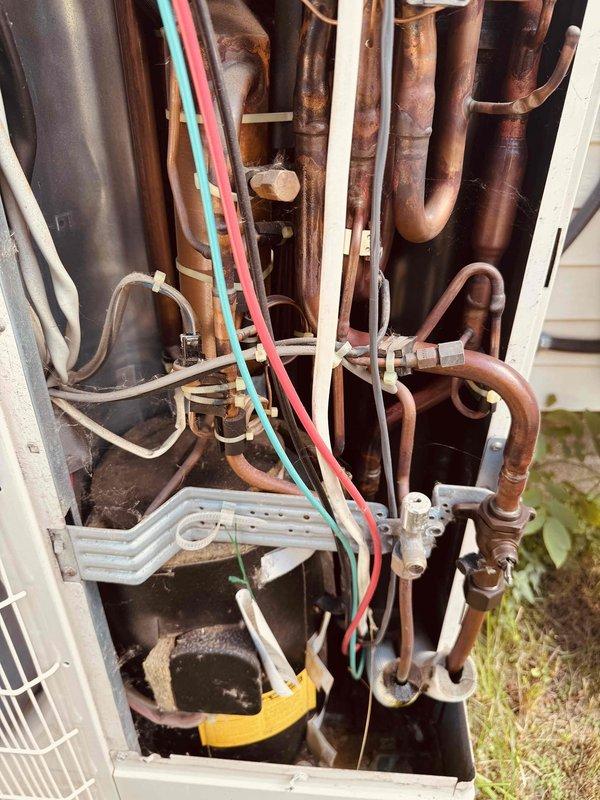 Completed routine tune-up maintenance on both mini-split and heat pump systems, each approximately eight years old. Performed comprehensive inspection of outdoor unit components including refrigerant lines, electrical connections, and compressor assembly. All systems operating within normal parameters with no issues identified or repairs required.