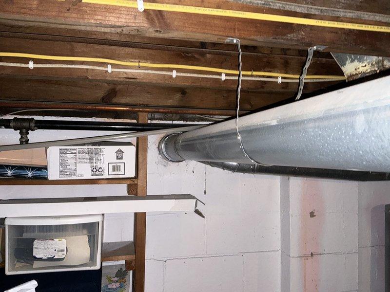 Conducted comprehensive assessment of existing HVAC system in crawl space for equipment replacement estimate. Documented current furnace and air conditioning unit conditions, including heavily corroded copper piping connections, aging water heater, deteriorated ductwork, and compromised structural elements in confined utility space. Provided detailed photographic documentation and replacement recommendations for complete system upgrade scheduled for installation.