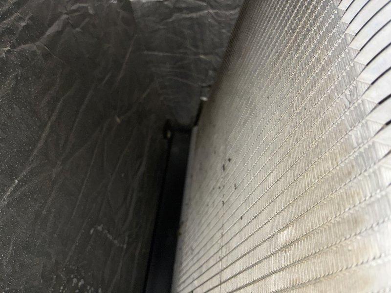 Completed furnace tune-up on 9-year-old unit. Performed comprehensive inspection of evaporator coil assembly, noting moderate dust and debris accumulation on aluminum fins with minor discoloration consistent with normal operational wear. Coil structure remains intact and functional with no signs of damage or refrigerant leaks observed on copper line connections.