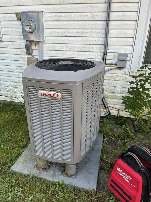 Completed maintenance visit on 4-year-old Lennox heat pump system with outdoor condenser unit and electric heat strips located in attic. Performed comprehensive inspection of outdoor unit including electrical components, capacitor, contactors, and control board; all components found to be in good working condition. Verified proper system operation and confirmed unit is functioning as designed.