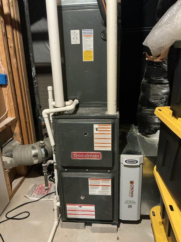 Completed comprehensive heating maintenance on Goodman gas furnace system. Performed combustion analysis using digital analyzer, confirming optimal performance with natural gas readings showing 92.5% efficiency, 52 ppm CO, 4.6% O2, and 9.2% CO2 - all within manufacturer specifications. Inspected furnace components, humidifier system, air filtration unit, and PVC venting for proper operation and safety compliance.
