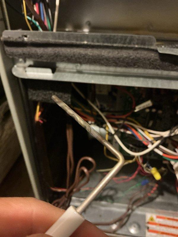 Completed routine MVP heating maintenance visit on 11-year-old system. Inspected furnace components, replaced dirty air filter with visible dust accumulation, and examined internal electrical connections and wiring. Noted significant dust and lint buildup on horizontal metal surfaces within the unit that was documented for maintenance records.