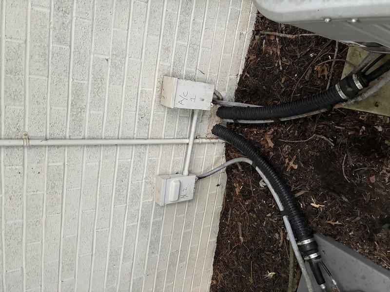 Installed dedicated 10-2 circuit across basement to service second air conditioner unit, terminating in 4x4 deep square junction box to properly supply both AC disconnects with separate circuits. Corrected unsafe double-tap condition at main disconnect lugs where existing 2-pole 30-amp circuit was improperly feeding both units. Replaced incompatible Siemens breakers installed in GE panel with proper manufacturer-matched breakers, including one tandem breaker. Relocated one circuit to sub panel for improved load distribution and code compliance.