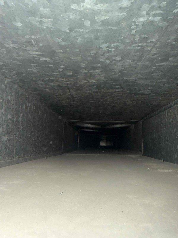 Completed comprehensive duct cleaning service for residential HVAC system. Upon inspection, discovered heavy accumulation of dust, debris, and particulate matter throughout the ductwork, with particularly dense buildup on ceiling surfaces and walls showing fibrous coating and visible clumping. Performed thorough cleaning of all accessible ductwork using professional-grade equipment to remove contaminants and restore proper airflow. System showed evidence of extended operation without maintenance, with significant improvement in duct cleanliness achieved upon completion.