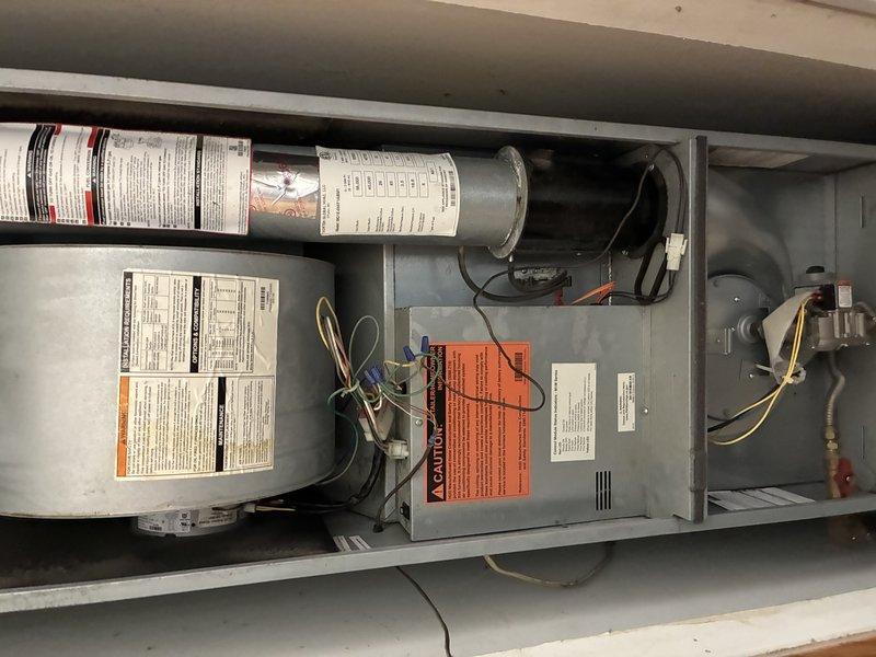 Performed comprehensive tune-up on 4-year-old furnace system. Conducted full inspection of blower motor assembly, gas valve, ignition system, and heat exchanger. Verified all electrical connections, tested control board functionality, and confirmed proper operation of safety controls. Checked gas pressure, cleaned burner assembly, and inspected venting components. System operating within manufacturer specifications with no issues identified.
