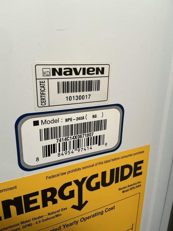 Performed descaling maintenance on an 11-year-old Navien NPE-240A tankless natural gas water heater. Flushed the heat exchanger system to remove mineral buildup and restore optimal performance, completing the service during the confirmed morning appointment window.