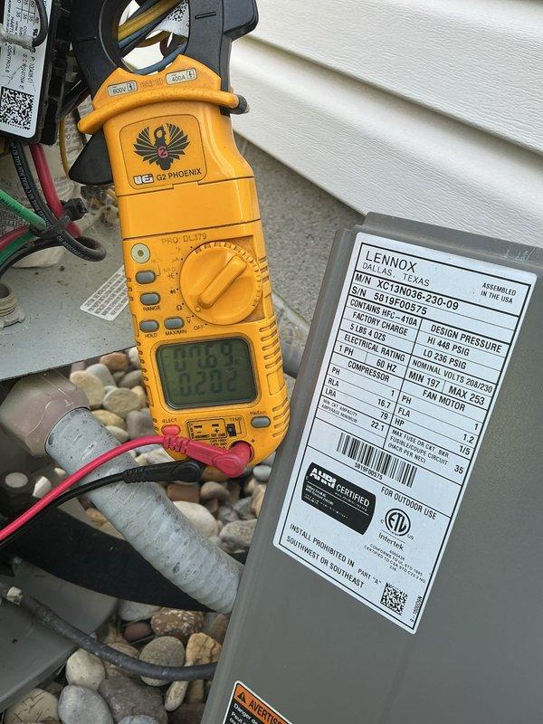 # HVAC Service Call - No Cooling Condition

Responded to service call for AC unit not operating following electrical disturbances including flickering lights, unusual sounds, and electrical panel tripping. Customer reported system shut down completely after these events occurred.

## Diagnostic Findings

Upon arrival, performed comprehensive electrical diagnostics on Lennox XC16N024-230-09 condenser unit (Serial: 5215E50675) utilizing digital multimeter. Unit showed signs of electrical fault condition. Inspected outdoor condensing unit installation and verified proper refrigerant line connections and physical mounting integrity.

Proceeded to main electrical service panel to investigate reported power interruption. Examined circuit breaker panel configuration and identified tripped breaker condition affecting HVAC circuit. Inspected main feed conductors, branch circuit wiring, and breaker connections for signs of overheating, loose connections, or damage. Verified proper wire sizing an