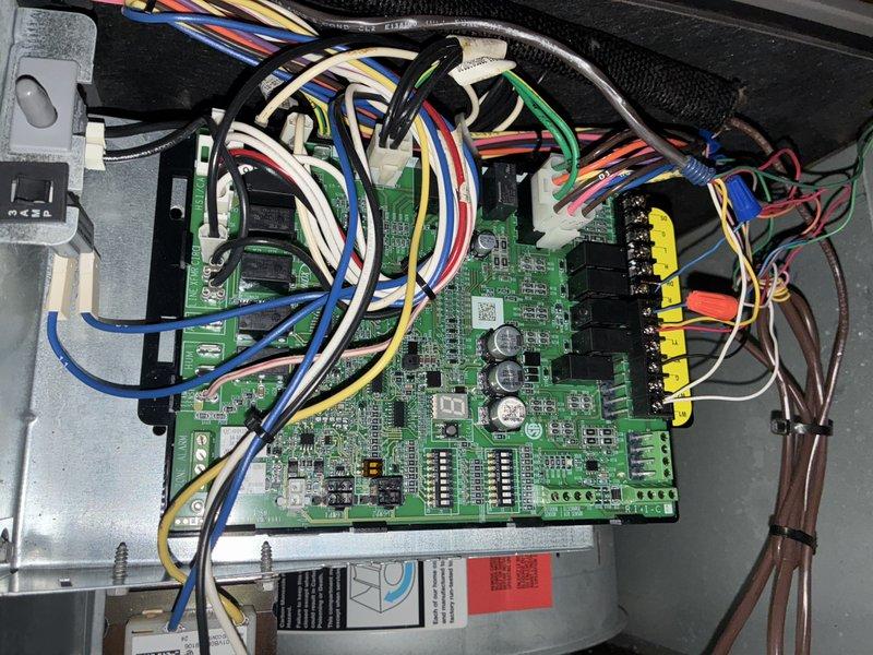 Completed annual maintenance on a 5-year-old air conditioning system. Inspected control board, wiring connections, and electrical components within the unit, confirming all terminals and connections were secure. Evaluated evaporator coil condition, noting dust and dirt accumulation on the fins that could impact heat transfer efficiency and system performance.
