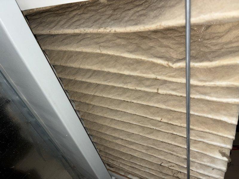 Completed annual maintenance on a 5-year-old air conditioning system. Inspected control board, wiring connections, and electrical components within the unit, confirming all terminals and connections were secure. Evaluated evaporator coil condition, noting dust and dirt accumulation on the fins that could impact heat transfer efficiency and system performance.