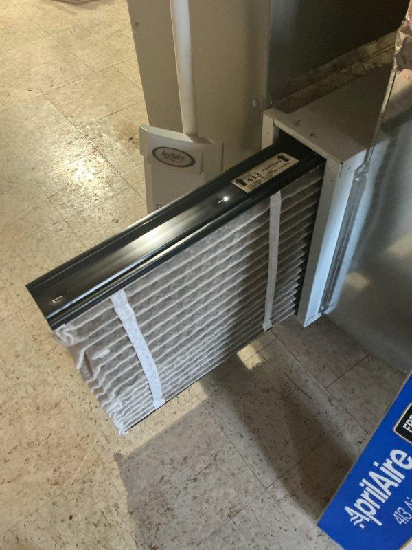 Completed seasonal AC tune-up on residential HVAC system. Inspected furnace unit, replaced air filters with new AprilAire filters, and verified proper operation of all system components including ductwork connections and condensate drainage system.