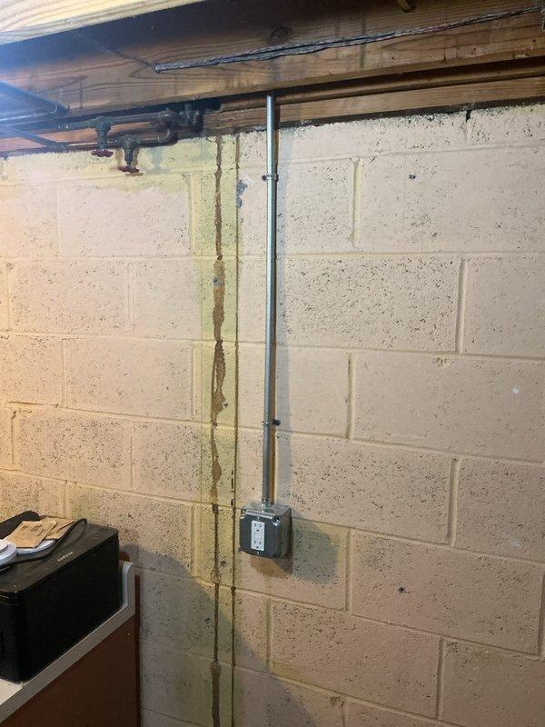 Installed five new 120-volt outlets in the laundry room and bar area, including dedicated circuits for washer and refrigerator/freezer. Installed a new 3-prong dryer outlet to code specifications. Added two new light fixtures in the laundry area and integrated them with the existing furnace light switch for unified control.
