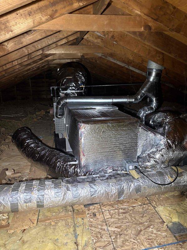 Relocated existing furnace system from ground level to attic space and installed new horizontal air handling unit with metallic casing. Completed full ductwork redesign and installation using flexible metallic ducting with reflective insulation, routing supply and return lines throughout attic space to optimize airflow distribution. Replaced electrical disconnect components with 30-amp fuses rated for 250VAC to meet code requirements for relocated equipment.