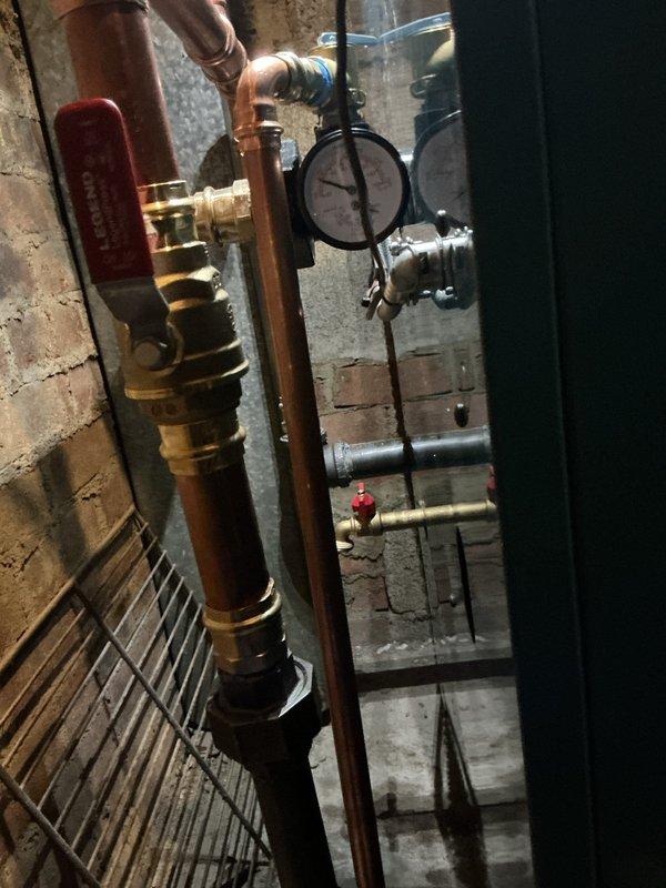 Completed installation of new hot water boiler system including all associated copper piping, pressure gauges, isolation valves, and safety controls. Installed carbon monoxide detector in living space per code requirements, with all components tested and verified operational upon completion.
